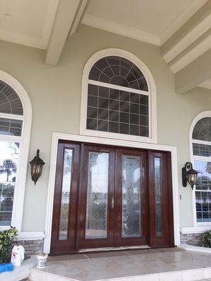 Before & After Front Door Staining & Exterior painting in Edgewater, FL (2)